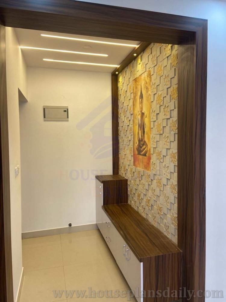 entrance foyer design with shoe rack